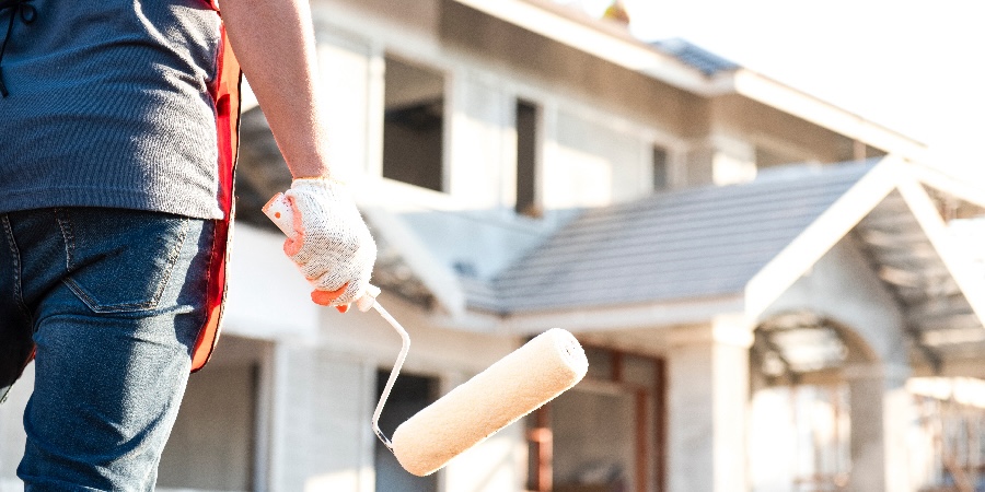 Construction worker plans to paint large house during COVID-19